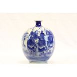 Chinese Bulbous Vase decorated with Blue and White Scene of Elders, two blue rings to base, 22cms