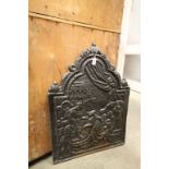 Antique Cast Iron Fire Back with Shaped Top and relief scene with figures