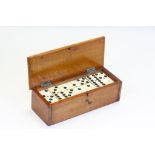 Mahogany cased set of vintage Bone & Ebony Dominoes