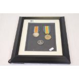 Framed and glazed WW1 Medal Pair to include The Victory Medal & The British War Medal issued to