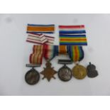 A WW1 Royal Navy group of four medals to include Victory Medal, British War Medal, Mons Star &