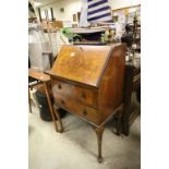 Mid 20th century Walnut and Crossbanded Bureau with Two Drawers and raised on cabriole legs