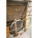 A vintage Spanish grub axe and sledge hammer together with a Rustic Sieve