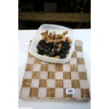 Onyx Chess board with set of wooden Chess pieces