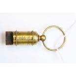Brass whistle stamped Titanic