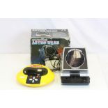 Two vintage Grandstand electronic games to include a boxed Astro Wars and Munchman