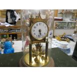 Brass Anniversary Clock with enamel dial and glass dome