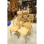 Set of Four Ercol Light Elm and Beechwood Windsor Hoop Back Dining Chairs with blue labels