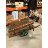 Old Rustic Wooden Cart with Metal Wheels