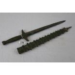 An Asian reproduction dagger, foliate scroll decorated handle, pagoda style scabbard, length