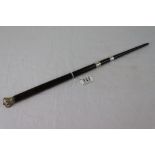 A wooden tapered conductors baton with white metal collars and crown shaped finial, length