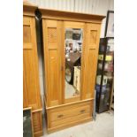 Edwardian Satin Walnut Wardrobe with Mirrored Single Door and Drawer below. Starburst Carved