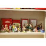 A Collection of Fourteen Royal Doulton Bunnykins character figures to include Paperboy (DB77), Polly