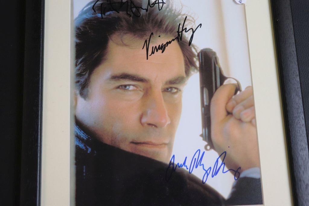 Film Autographs - Collection of 7 framed & glazed James Bond 007 signed photos to include Mollie - Image 6 of 8