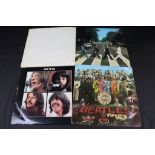 Collection of four LP's from The Beatles to include White Album No. 0119441 top loader with black