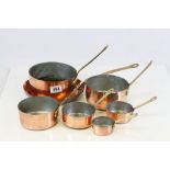 Seven vintage Copper & Brass saucepans