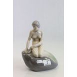 Royal Copenhagen model of a Mermaid seated on a rock, marked to base KFX 4431
