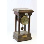 Oak cased key wind Mantle clock on column supports with 1920's dedication