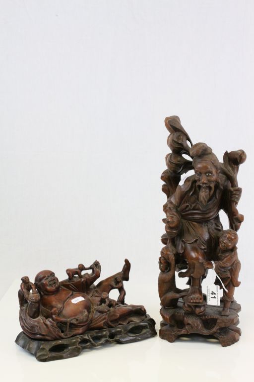 Japanese Carved Hardwood Figure of a Traveller with Child together with a Japanese Carved Hardwood
