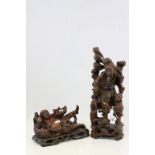 Japanese Carved Hardwood Figure of a Traveller with Child together with a Japanese Carved Hardwood