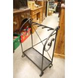 A metalwork stick / umbrella stand