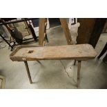 Rustic Pine Bench raised on Four Stick Legs