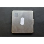 Silver cigarette case with engine turned decoration, cartouch with initials J.M.B, gilt lined