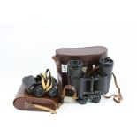 Cased pair of Omega 7 x 50 binoculars and a cased pair of Zeiss Jenoptem 8 x 30W binoculars