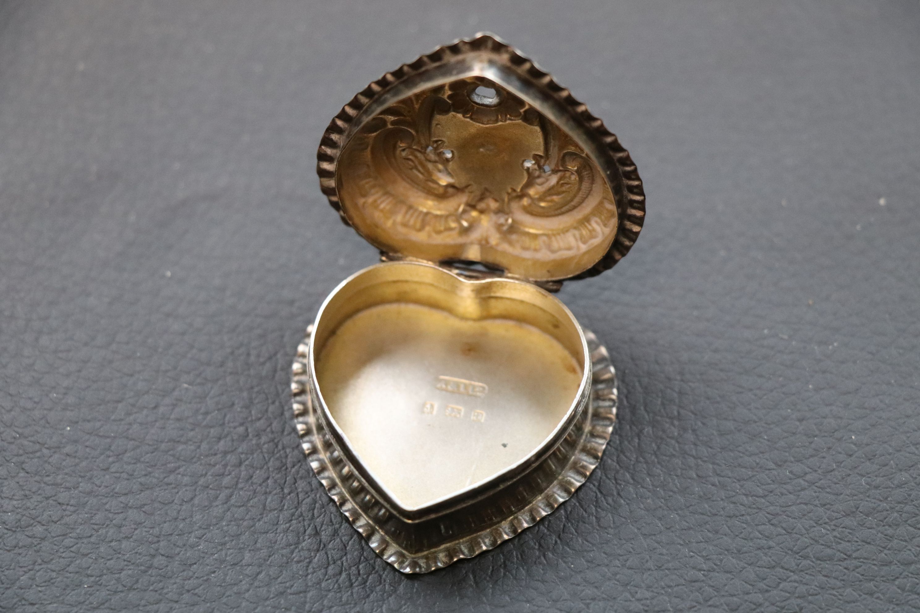 Silver trinket pot with hinged lid in the form of a heart, repousse scroll decoration, makers Adie & - Image 2 of 3