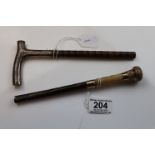 A silver walking cane handle with foliate scroll engraving, makers mark indistinct, London 1908
