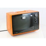 Hitachi Solid State Television in bright Orange