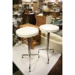 Pair of Stools with Circular Faux Leather Seats raised on tubular chrome bases