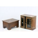 Oak smokers Cabinet with glazed panels to the front and a small Oak foot stool