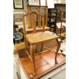 Early 20th century Queen Anne Style Walnut Chair with Bergere Seat raised on cabriole legs