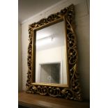 Large pierced gilt framed looking glass