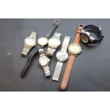Tub of mixed watches to include a vintage Timex