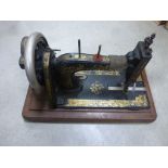 Early 20th century Mahogany Cased ' Bradbury & Company ' Sewing Machine