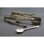 A pair of George III silver sugar tongs, engraved garland style decoration, makers Samuel