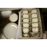 Noritake White Part Tea Set with white body and gold and black greek key style border