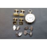 Silver open faced fob watch, white enamel dial (af) with foliate decoration to centre, black Roman