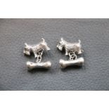 Pair of silver dog and bone cufflinks
