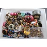 A large quantity of vintage costume jewellery to include necklaces, bangles, bracelets, watches,