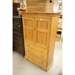 Pine Cupboard, the two upper doors opening to reveal shelf above three long drawers