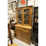 Late Victorian Oak Bookcase / Cupboard, the upper section with two glazed doors above two drawers