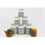 Collection of seven Hornsea pottery storage jars and a teapot