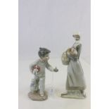 Lladro figurine of a Lady with a Chicken and basket & a Nao model of a Boy with candlestick