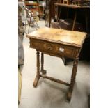 19th century Walnut Veneered Work / Sewing Table with hinged lid on double turned reeded supports