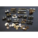 Collection of silver & gold cufflinks and tie clips