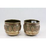 Pair of Indian Brass Jardiniere's with Copper and Silver Leaf and Floral Decoration, the panels