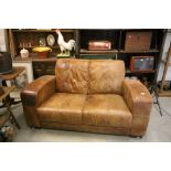 Two Seater Tan Leather Sofa with stitched detail